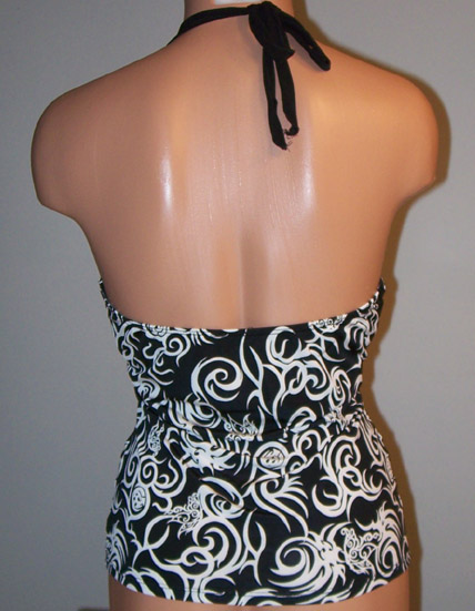 Back view of black and white top.